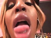 Blonde black shemale shows off her busty tits and ass