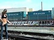 Angelina strips on the train tracks