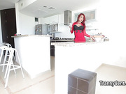Redhead tgirl doing it solo in the kitchen
