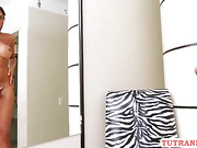 Very hot brunette tranny strokes her cock and squirts jizz