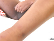 Big ass black TS Pinky spanks her rod in bed