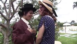 Crossdresser sucks Alessandra Ribeiro's dick in the park