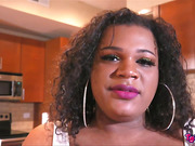 Chubby black tgirl playing her small cock in the kitchen