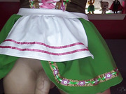 Busty Bailey in sexy dress jerks her hard cock off