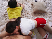 Guy fucks two hot tgirls while they are watching TV