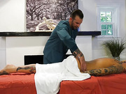 Tattooed blonde bimbo Nadia Love gets fucked on the massage table