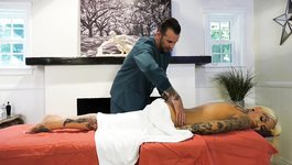 Tattooed blonde bimbo Nadia Love gets fucked on the massage table