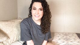 Curly haired sexy tgirl gets handjob and cums