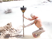 Seductive Danni Daniels posing in mud