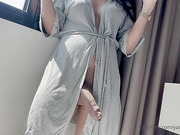 TS Yasmin Dornelles pees and strokes her massive cock to orgasm