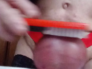 testicle torture with brush