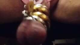 pink negative chastity with heavy metal rings and lock