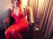 Busty mature TS Delia DeLions cums through her dress