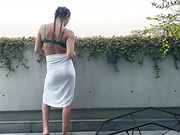 Active shemale tops her man on the balcony