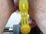 Without a penis and without testicles, rings and yellow clamps on the