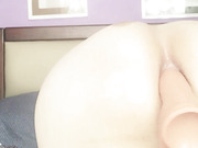 Pretty lil tranny DaniTheCutie holds a thick dildo in her tight ass