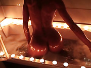 Natassia oils and fingers in candle bath