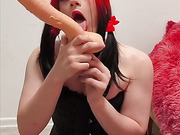 Redhead SerenaLuv deepthroats huge dildo
