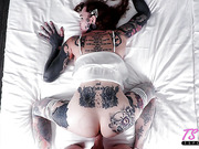 Heavily inked tgirl with small cock gets fucked in POV