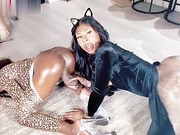 Two black tgirls suck each others big cocks on webcam
