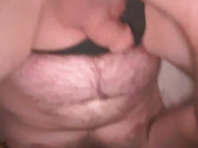 Bed, black thong, purple dildo
