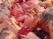 Heavily inked TS with big cock fucks emo girl