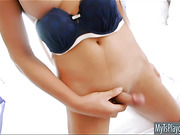 Busty shemale shows off ass and masturbates her hard cock